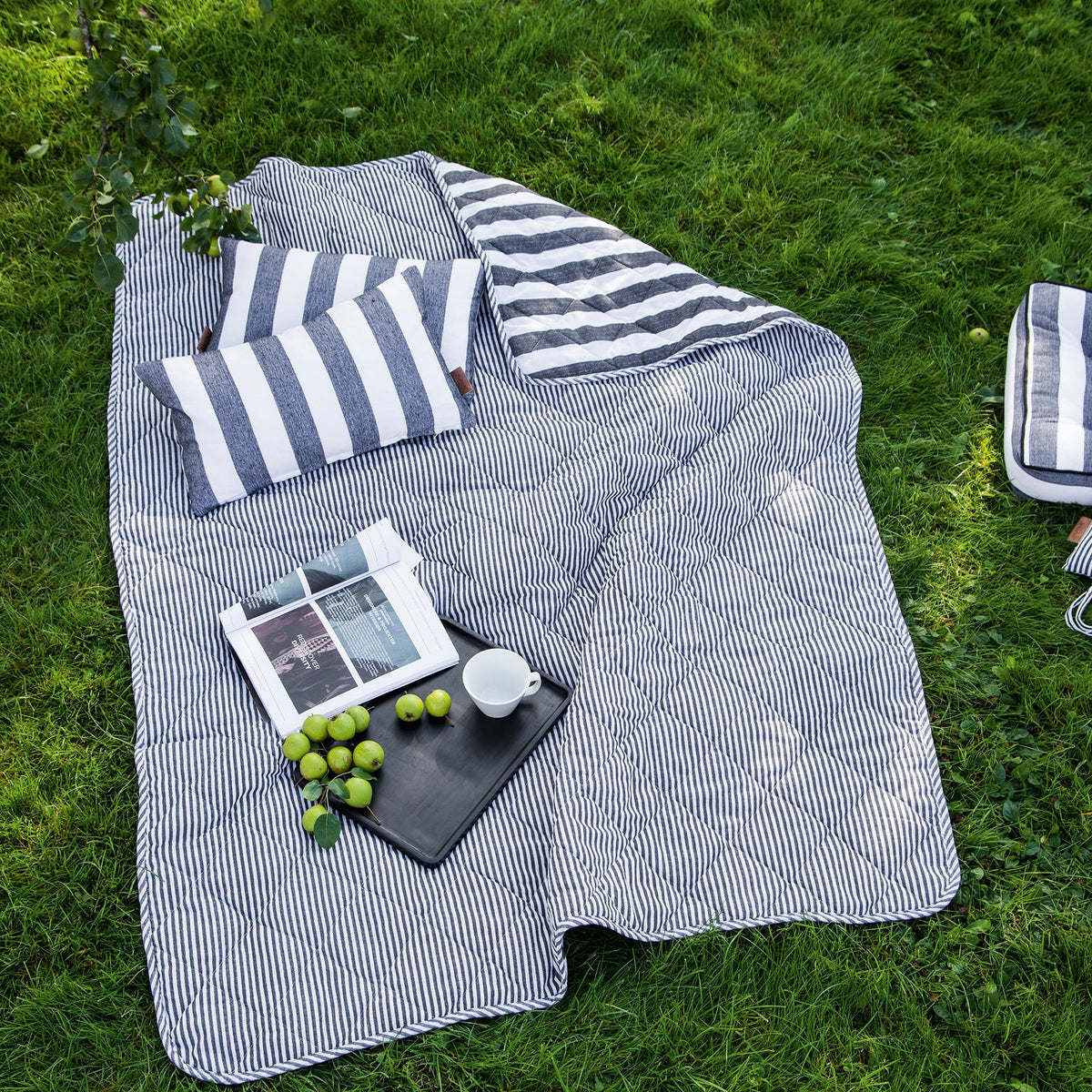 Urban New Stripe quilt by Juna on the lawn